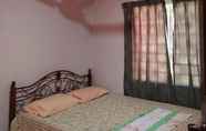 Kamar Tidur 7 MZR Homestay Geliga