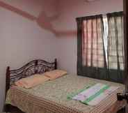 Bedroom 7 MZR Homestay Geliga