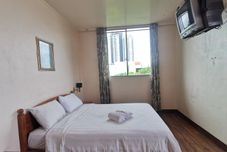 Kamar Tidur SUPER OYO 89864 Hotel Holiday Park