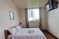 Bedroom SUPER OYO 89864 Hotel Holiday Park