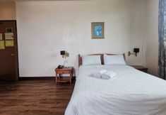 Kamar Tidur 3 SUPER OYO 89864 Hotel Holiday Park