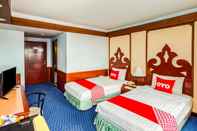ห้องนอน Grand Thara Hotel 