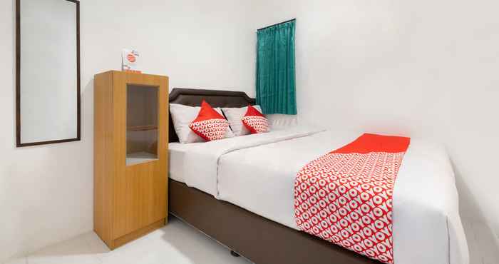 Bedroom Smart Stay at Homey Guest House