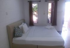 Bedroom 4 Dlima Beach Inn