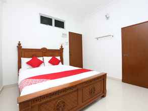 Kamar Tidur 4 SUPER OYO 89435 Nusantara Group Hotel