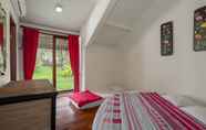 Kamar Tidur 6 The Village Resort Bogor By Waringin Hospitality