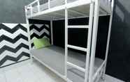 Kamar Tidur 4 Dorm Room at Hostel Backpacker44