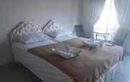 Bedroom 4 Rain Residence Denpasar