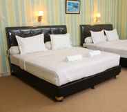 Bedroom 3 Hotel Natama Syariah