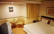 Bedroom 5 Sena Place Hotel