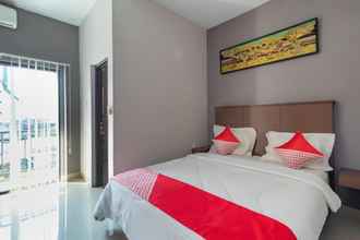 Kamar Tidur 4 OYO 3255 Enam Delapan Guest House Syariah