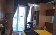 ห้องนอน 4 Studio Room at Tamansari Papilio Apartment Surabaya (38) by HUM'Z