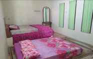 Bedroom 6 Penginapan Citra Agung Santolo