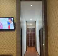 Lobby 4 Comfort Room near Airport at Homestay Family's