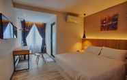 Kamar Tidur 4 The Marion Hotel