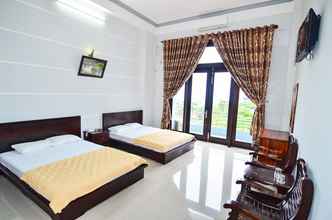 Phòng ngủ 4 Huong Bien Hotel