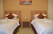 Bedroom 3 Ovi Hotel Palu