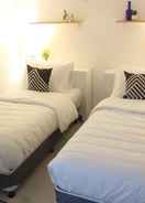 BEDROOM The White Hotel Bacolod - Burgos by HometownPH