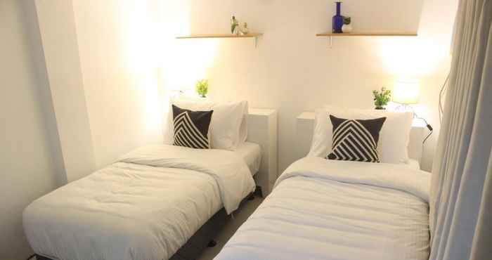 Kamar Tidur The White Hotel Bacolod - Burgos by HometownPH