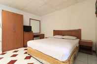 ห้องนอน Hotel Prapancha
