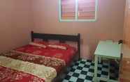 Kamar Tidur 7 Cozy Place at Heerry's Guest House 1