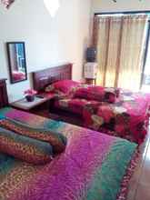 Bedroom Cozy Room at Homestay Griya Asri