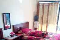 Bedroom Cozy Room at Homestay Griya Asri