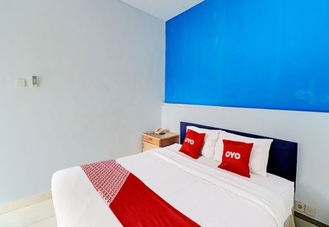 卧室 OYO 91788 Bali Tulip Hotel