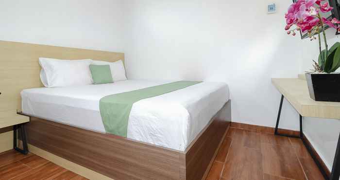 ห้องนอน Cozy Room at Grya Rintaka Guest House