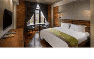 ห้องนอน 4 Treasures Hotel & Suites