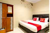 Kamar Tidur OYO 2076 Oxy Art Boarding House