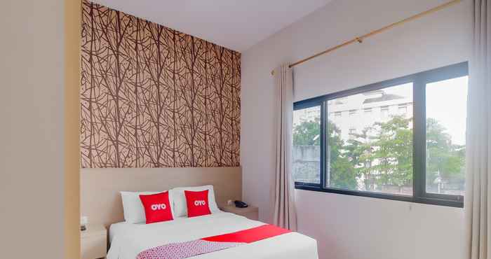 Bedroom OYO 90312 Bahu Bay Hotel
