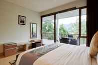 Bedroom 7 BR Hill View Villa with a private pool 1