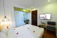 Phòng ngủ Blue Hanoi Inn Luxury Hotel & Spa