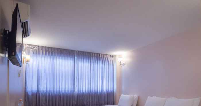 Kamar Tidur Bird Room Hotel Pratunam