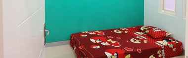 ห้องนอน 2 Comfort Room at Homestay SHAAKA Surabaya