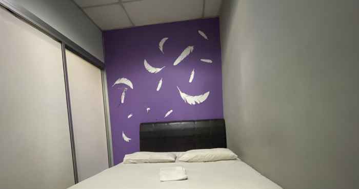 Phòng ngủ OYO 89760 Harmoni Inn Hotel