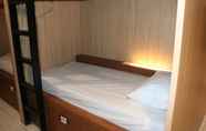 Kamar Tidur 6 Woodlot Hostel Malang