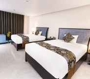 ห้องนอน 4 Royal Quang Binh Hotel