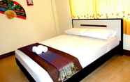 Kamar Tidur 5 Moradok Thai Guesthouse