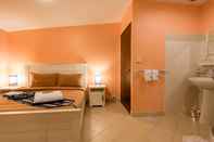 Bedroom Tananza Resort and Homestay Phuket
