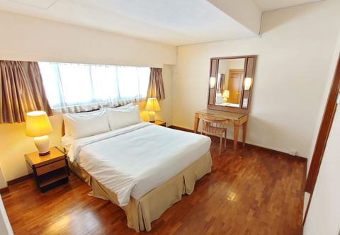 Phòng ngủ Orchard Point Serviced Apartments