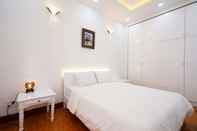 Kamar Tidur HoLo Garcerie Saigon Serviced Homestay