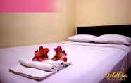 Kamar Tidur 7 Deldhia Hotel