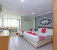 Bedroom 2 OYO 90118 Suntex Hotel