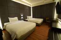 Kamar Tidur De Lobby Suite Hotel