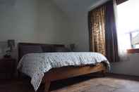 Kamar Tidur Bedjo Homestay by Dasinem