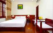 Kamar Tidur 3 Nhi Trung Hotel