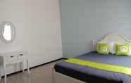 Bedroom 2 Homey Homestay Syariah