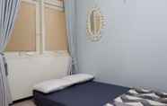 Bedroom 4 Homey Homestay Syariah